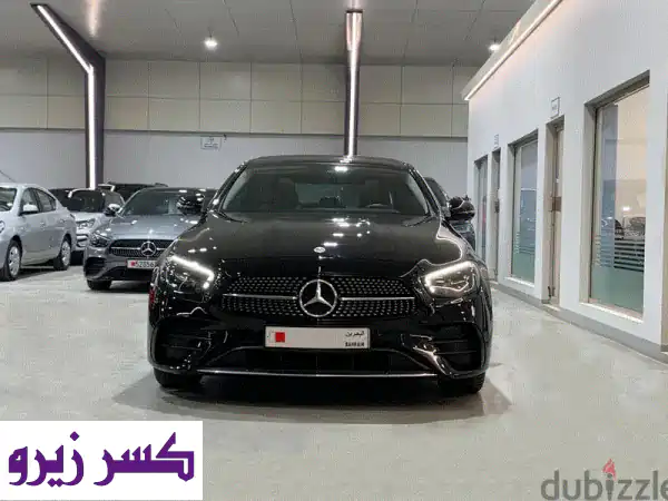 امتلك الأناقة والفخامة: مرسيدس E300 موديل 2022 سوداء بحالة ممتازة - تمويل وتقسيط ميسّر!