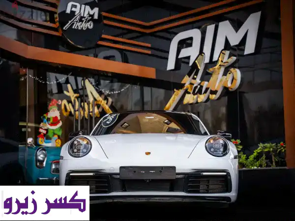 بورش 911 كاريرا 2022: أبيض كاريرا، أحمر بوردو، 18 ألف كم...