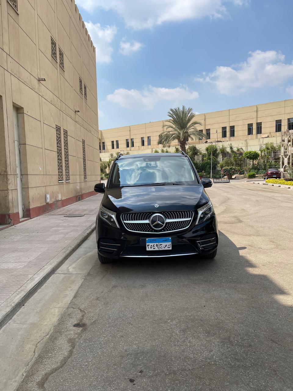 \"Book Now: Travel in Ultimate Group Luxury with Our Mercedes V250 Chauffeur Service to The Nile Ritz-Carlton, Cairo!\"