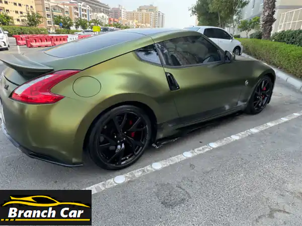 أداء آسر: نيسان 370Z GT إيديشن 2016 (GCC) بلون أخضر زيتوني فريد - جاهزة للانطلاق في دبي!